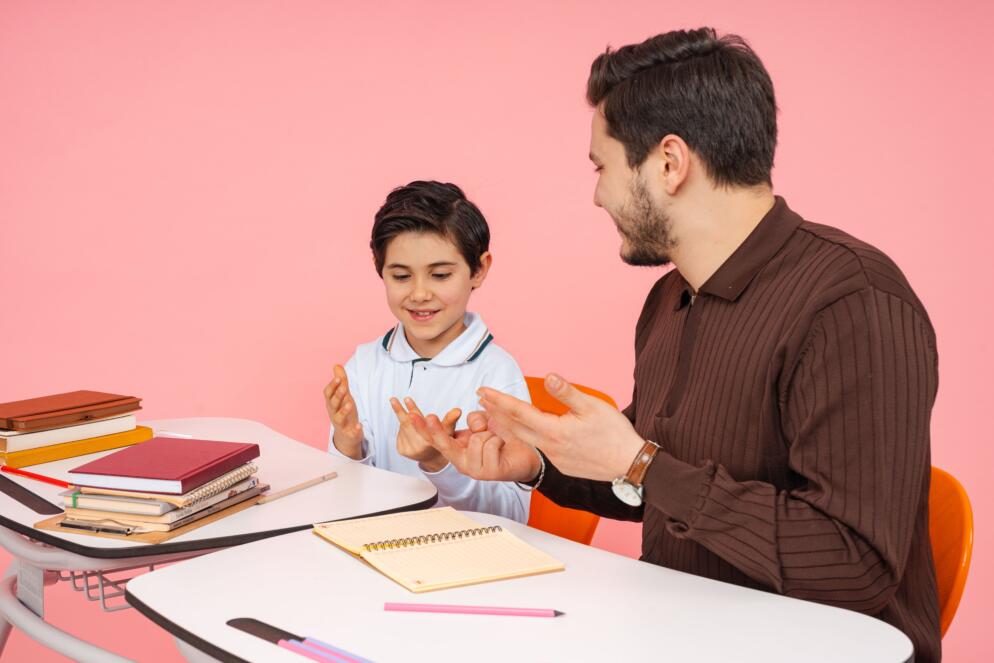 A teacher instructing a student