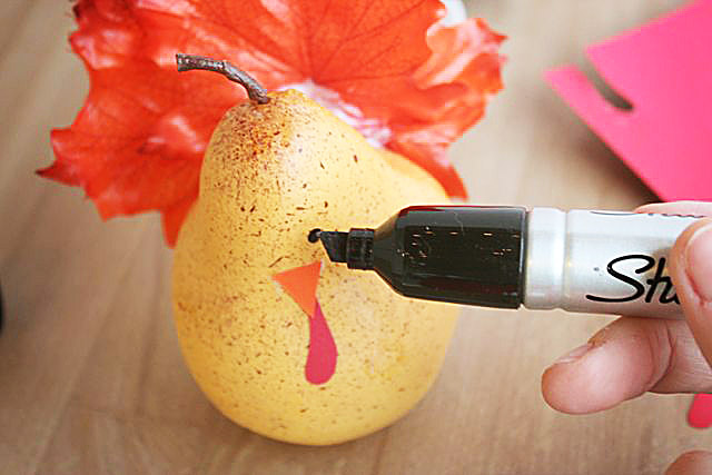 Adding eyes to your DIY pear turkeys