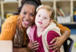 9-year-old girl with Down Syndrome with her elementary school teacher