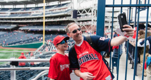 Dad and child at the stadium for the Washington Nationals