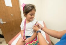 Little girl getting a vaccine