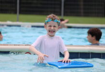 Boy in a swimming pool at Green Acres Camp