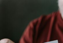 A person removes a Valentine's Day card from an envelope