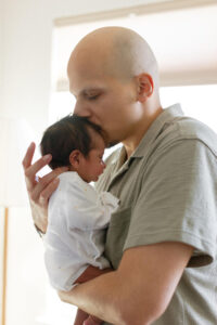 Dads With Wisdom member Obed Molina with his first child