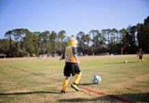 Training Tips for Fall Sports Tryouts A school-age girl training with a soccer ball