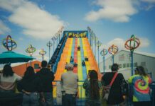 Kids on a slide at a carnival