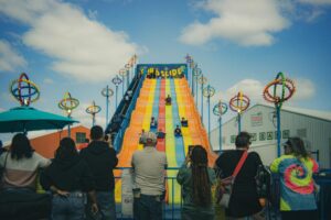 Kids on a slide at a carnival